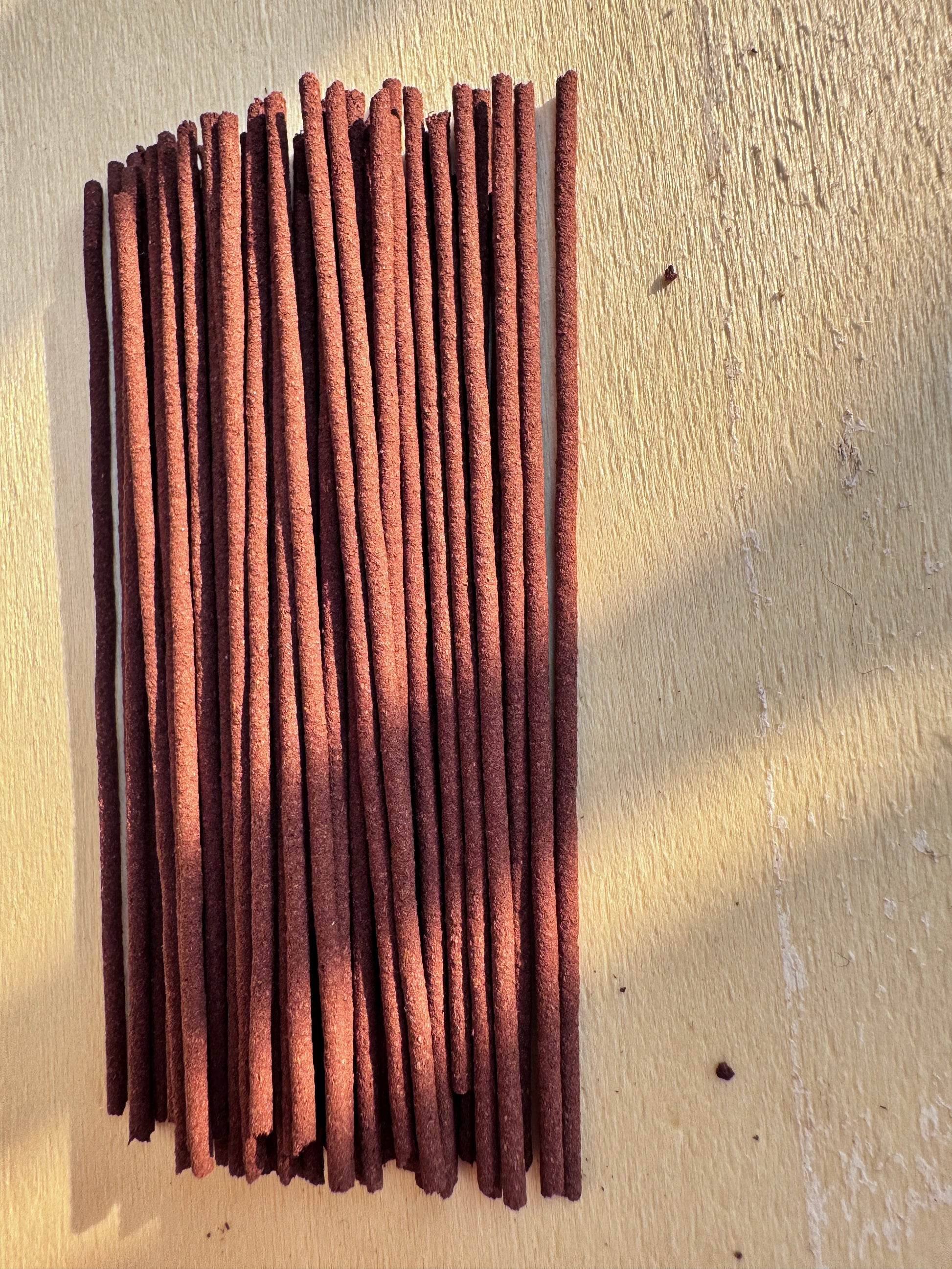 Texture detail of authentic Hainan Jiang Zhen, highlighting dense resin and dark aging